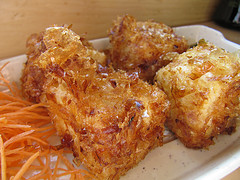 Fried tofu with grated carrots