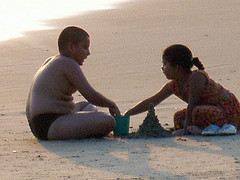 Boy and girl on the shore