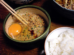 Soybean and fresh egg in a bowl